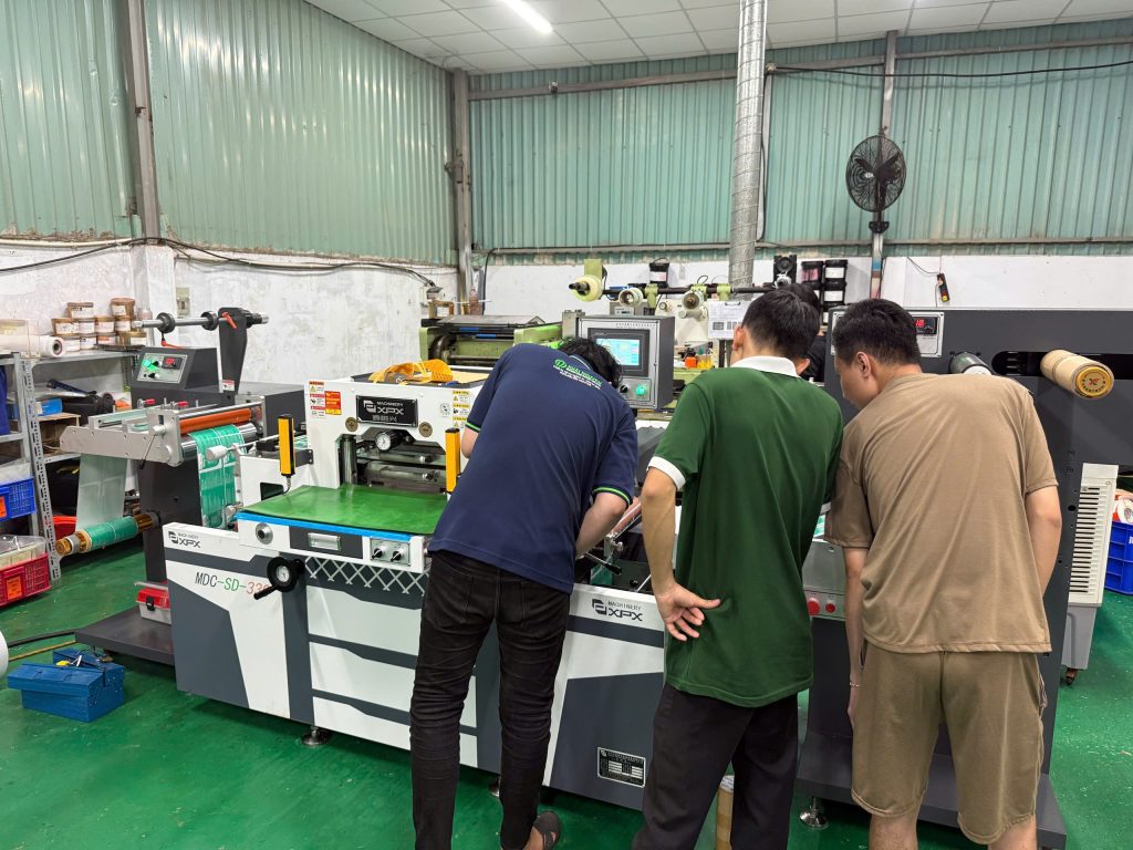 Khai Nguyen staff delivering the machine to the customer’s production site