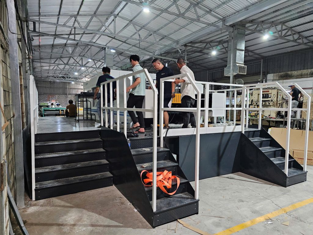 Khai Nguyen staff delivering the machine to the customer’s production site